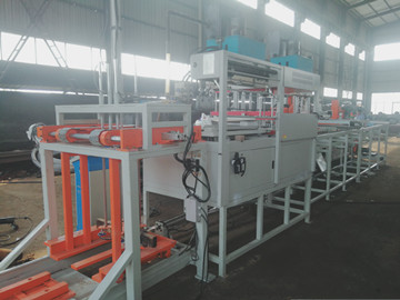 LPG cylinder auto feeding machine with auto plastic film cover device